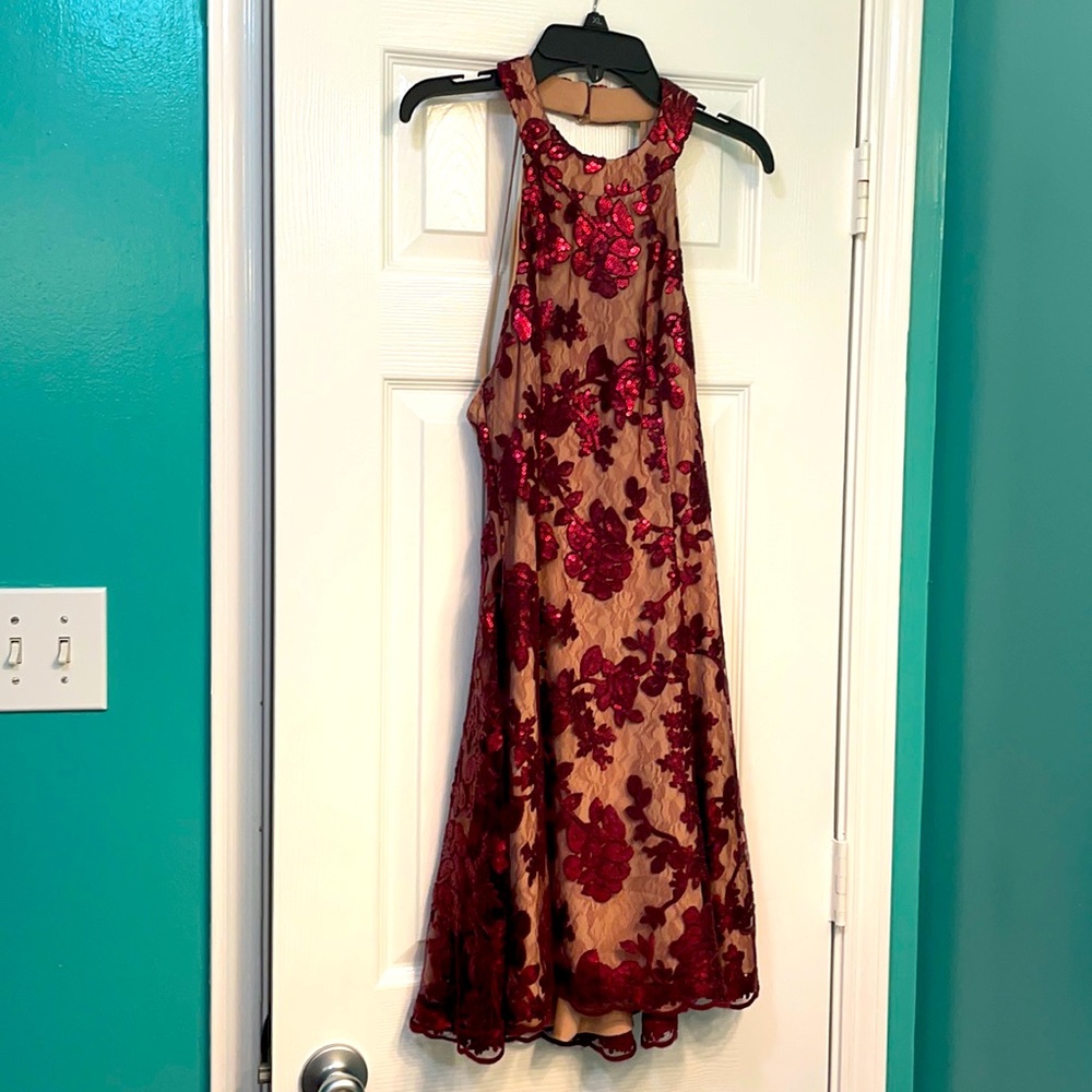 Very formal maroon with tan underneath